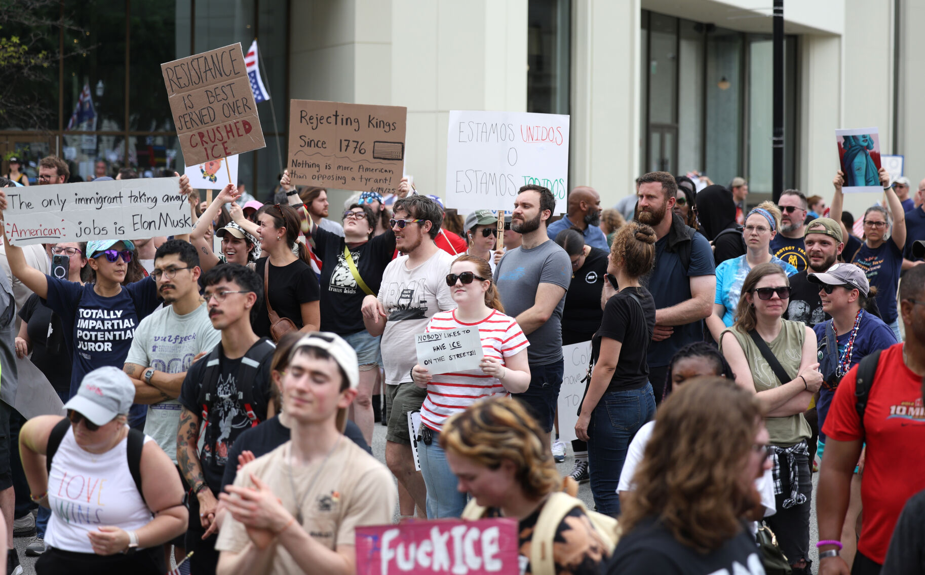 People stand during No Kings rally.JPG